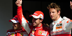 Ferrari's Fernando Alonso (left) with McLaren Mercedes'Jenson Button in Italy during their Formula One heyday.