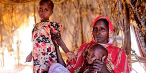Inside Dadaab:Ladhan Waraq Yusuf,30,with daughter Sahlan,3,and son Weli,1. Sahlan became severely malnourished and almost died during the Horn of Africa famine in 2011.