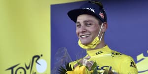 Nertherland’s Mathieu Van Der Poel wears the yellow jersey after winning the second stage of the Tour de France. 