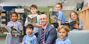 Reading success story:Principal Rhys Coulson and students at Templestowe Heights Primary School.