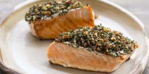 Vibrant barbecued salmon with tahini and herbs.