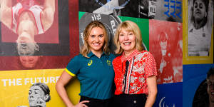 Harvey Norman CEO Katie Page with Olympic champion Ariarne Titmus. Ms Page wants corporates and government to make investment in sport a priority.