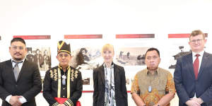 Baruch (left) welcomes officials including German ambassador to Indonesia,Ina Lepel (centre),to the photo exhibition last month.