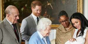 Prince Harry and Meghan,joined by her mother Doria Ragland,introduce Archie to the Queen and Prince Philip in 2019.