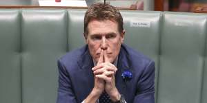 Industry Minister Christian Porter has declared part of his legal fees for suing the ABC for defamation were paid by a blind trust.