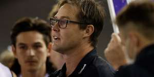 Carlton coach David Teague addresses his players against the Saints.