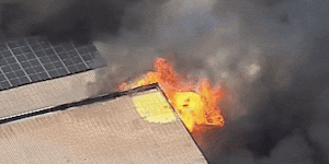 Aerial view of a fire at a Metro Petroleum service station in Fairfield,Sydney on December 9,2025.