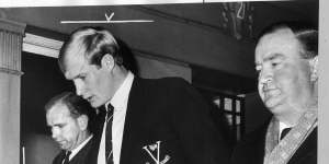 Carl Ditterich leaves a VFL tribunal hearing in 1966.