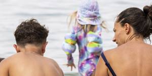 Flat and fancy:Families enjoy Balmoral Beach.