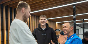 Clarkson chats with Ben McKay and Callum Coleman-Jones on the day he was announced as North Melbourne’s new coach