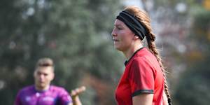 Robb competes in a match during the Quadball NSW competition.