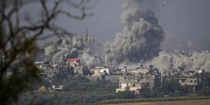 Smoke rises following an Israeli airstrike in the Gaza Strip,as seen from southern Israel,on Monday.