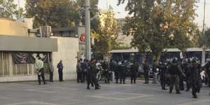 Police outside the Sharif University of Technology during a student protest.