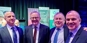 Celebrating with the PM:From left,HC Public chairman Mark Darras,Anthony Albanese,HC Public executive director Andrew Landeryou and HC Public chief executive John-Paul Blandthorn at the John Curtin Oration.