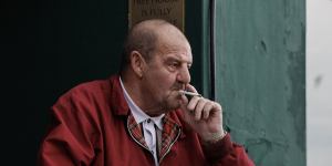  A man sits outside a pub in Clacton-on-Sea.