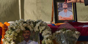 Nepalese pay their respects to Bipin Joshi.