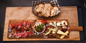 Cheese and charcuterie platters work well in the snug confines of the cottage.