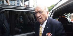 Alan Jones arrives at court in his white BMW.