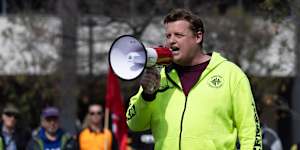 Zach Smith addressing a CFMEU rally in Canberra in 2024.