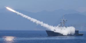A Taiwanese frigate fires an anti-air missile. Chinese and Taiwanese and Chinese forces have staged rival military demonstrations in the Taiwan Strait amid heightened tensions.