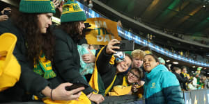 Matildas captain Sam Kerr mingles with soccer fans after the World Cup send-off game against France at Marvel Stadium last week.