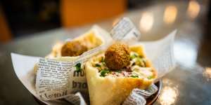 Wazzup Falafel sells its signature dish on skewers,in house-made wraps with hummus;or as a FSP (falafel snack pack).