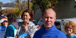 Independent Kooyong candidate Monique Ryan and Treasurer Josh Frydenberg were both handing out flyers at the Hawthorn pre-polling booth on Monday.