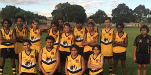 Elijah Doughty (third from left) with a Goldfields Football Academy team in Kalgoorlie.