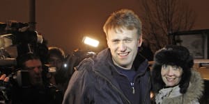 Russian opposition leader Alexei Navalny,left,and his wife Yulia when he was released from prison in 2011.