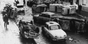 “A dozen overturned and burned cars litter the Rue Gay-Lussac where students had set up barricades last night in the middle of the Latin Quarter. ” May 11,1968.