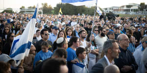 People gather for a Jewish vigil in support of Israel at Rodney Reserve in Dover Heights.