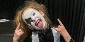 Molly Dunn,9,preparing to dance with Kiss.