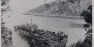 An Allied landing craft bearing a red star on the bridge,painted for the Yugoslav partisans.