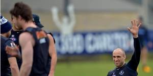 Hands up who wants a flag:Chris Judd in training.