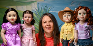 Lynda Bloxham (centre) with her Australian Girl dolls.