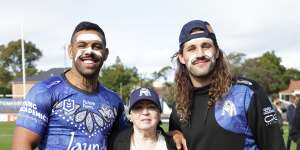 Josh Addo-Carr (left) and Josh Curran with Pam Brandy-Hall,designer of the Bulldogs Indigenous Round jersey.