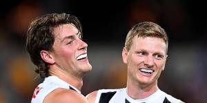Collingwood avert disaster with gusty win at the Gabba;Pendlebury ‘got sucked in’ before hitting Neale