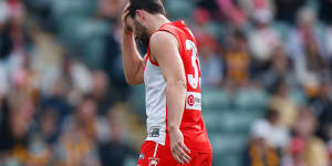 Patrick McCartin comes from the ground after suffering a concussion.