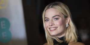 Margot Robbie says David Higgins gets her in her"best physical shape."