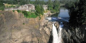 Salish Lodge sits over the magnificent Snoqualmie Falls,one of Washington State's biggest tourist attractions.
