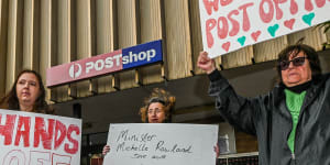 Protesters stamp their feet as another local post office gets the chop