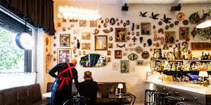 Bar Lourinha's bric-a-brac filled wall.