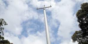 A composite power pole made of fibreglass and resin with UV coating.