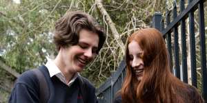 Davidson High School year 10 students Daniel Kenny and Annika Hore with the pouches used by the school to limit phone usage during school hours.