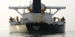 The vessel name and International Maritime Organization (IMO) number is displayed on the bow of impounded Iranian crude oil tanker,Grace 1,as it sits anchored off the coast of Gibraltar,on Saturday,July 20,2019. Tensions have flared in the Strait of Hormuz in recent weeks as Iran resists U.S. sanctions that are crippling its oil exports and lashes out after the seizure on July 4 of one of its ships near Gibraltar. Photographer:Marcelo del Pozo/Bloomberg