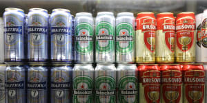 Cans of Baltika lager,a Carlsberg A/S brand,left,Heineken lager,manufactured by Heineken NV,center,and Krusovice lager manufactured by Pivovar Krusovice AS,sit on shelves inside an Essen hypermarket operated by Agrosila Group ZAO,in Naberezhnye Chelny,Russia,on Saturday,Aug. 27,2016. The recent flare up over Crimea may have just delayed Russia?s economic recovery. Photographer:Andrey Rudakov/Bloomberg