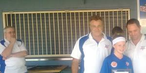 Cortnee Vine with under-12s coach Garry Dye (left) and senior men’s coach Terry Kirkham (right) at a presentation day in 2010.