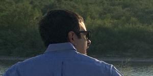 Laredo resident and lawyer Carlos Flores overlooking the Rio Grande river.