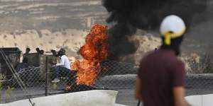 Palestinian youth during clashes with the Israeli military at the City End Circle near the al Jalazone refugee camp in al Bireh,Ramallah,West Bank.