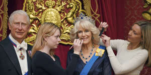 Artists Sophie Greenaway,second left and Claire Parkes add the finishing touches to a new Camilla,Queen Consort wax figure at Madame Tussauds in London,ahead of the coronation of King Charles III on May 6.
